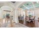 Formal dining room with hardwood floors and a chandelier at 7435 Gathering Ct, Reunion, FL 34747