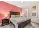 Spacious bedroom with a king-size bed and en-suite bathroom at 7435 Gathering Ct, Reunion, FL 34747