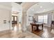 Game room featuring a pool table and hardwood floors at 7435 Gathering Ct, Reunion, FL 34747