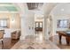 Elegant entryway with high ceilings and columns at 7435 Gathering Ct, Reunion, FL 34747