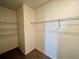 Large walk-in closet with wire shelving at 1823 Veterans Dr, Kissimmee, FL 34744