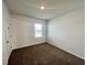 Bright bedroom with window and carpet at 1823 Veterans Dr, Kissimmee, FL 34744
