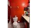 Bright bathroom with a shower/tub combo, toilet and vanity at 2440 Summerfield Way, Kissimmee, FL 34741