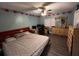 Main bedroom with king-size bed and built-in dresser at 2440 Summerfield Way, Kissimmee, FL 34741