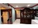 Entryway with a view into the living room and kitchen at 2440 Summerfield Way, Kissimmee, FL 34741