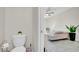 Small bathroom with toilet and view to living room at 9824 Red Eagle Dr, Orlando, FL 32825