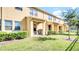 Exterior view of townhouses with patios at 9824 Red Eagle Dr, Orlando, FL 32825