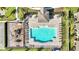 Community pool and recreation area with lounge chairs at 9824 Red Eagle Dr, Orlando, FL 32825