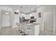Modern kitchen with white cabinets and gray island at 9824 Red Eagle Dr, Orlando, FL 32825