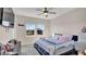 Bedroom with king bed, and two windows at 9824 Red Eagle Dr, Orlando, FL 32825