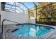 Private screened pool with brick pavers at 434 Captiva Dr, Davenport, FL 33896