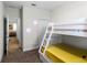 Bedroom with a bunk bed and access to a hallway at 434 Captiva Dr, Davenport, FL 33896