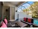 Covered patio with seating area overlooking the pool at 434 Captiva Dr, Davenport, FL 33896