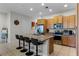 Modern kitchen with stainless steel appliances and granite countertops at 434 Captiva Dr, Davenport, FL 33896