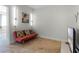 Cozy common area with a sofa and TV, perfect for relaxing at 434 Captiva Dr, Davenport, FL 33896