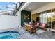 Relaxing patio with seating area and pool view at 434 Captiva Dr, Davenport, FL 33896