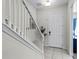 Bright and airy entryway with a white door and tiled flooring at 434 Captiva Dr, Davenport, FL 33896