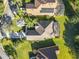 Aerial view of house and surrounding neighborhood at 100 Vizcaya Ct, Kissimmee, FL 34759