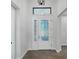 Bright entryway features a white door with glass accents at 224 Valencia Ridge Dr # 22, Auburndale, FL 33823