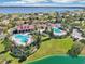 Resort-style community pool and clubhouse with tennis courts and lake views at 224 Valencia Ridge Dr, Auburndale, FL 33823