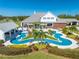 Aerial view of a large property with a unique pool design at 2780 Vickie Ct, Kissimmee, FL 34744