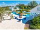 Resort-style pool with fire pit, pergola, and lounge chairs at 2780 Vickie Ct, Kissimmee, FL 34744
