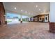 Large covered patio with brick pavers and lighting at 2780 Vickie Ct, Kissimmee, FL 34744