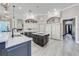 Luxury kitchen with a large island, stainless steel appliances, and custom cabinetry at 2780 Vickie Ct, Kissimmee, FL 34744