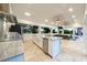 White modern outdoor kitchen with island and stainless steel appliances at 2780 Vickie Ct, Kissimmee, FL 34744