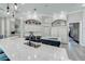 Open kitchen with large island, quartz countertops, and stainless steel appliances at 2780 Vickie Ct, Kissimmee, FL 34744
