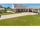 Brick home with large driveway, pool, and basketball court at 2780 Vickie Ct, Kissimmee, FL 34744