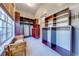 Large walk-in closet with ample shelving and hanging space at 2780 Vickie Ct, Kissimmee, FL 34744