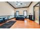 Comfortable bedroom with hardwood floors and ensuite bath at 2780 Vickie Ct, Kissimmee, FL 34744