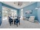 Bright dining room with large windows and seating for eight at 2780 Vickie Ct, Kissimmee, FL 34744