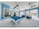 Game room with pool table and plenty of natural light at 2780 Vickie Ct, Kissimmee, FL 34744