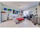 Bedroom with a bed, desk, and ample closet space at 2780 Vickie Ct, Kissimmee, FL 34744