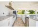 Modern outdoor kitchen with stainless steel appliances at 2780 Vickie Ct, Kissimmee, FL 34744