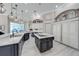 Spacious kitchen with large island, stainless steel appliances, and ample counter space at 2780 Vickie Ct, Kissimmee, FL 34744