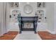 Ornate fireplace with built-in shelving and decorative accents at 2780 Vickie Ct, Kissimmee, FL 34744