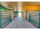 Bright and airy stable with multiple stalls and brick flooring at 2780 Vickie Ct, Kissimmee, FL 34744
