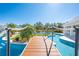 Wooden bridge over a freeform swimming pool at 2780 Vickie Ct, Kissimmee, FL 34744