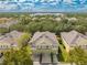 Aerial view of townhome community showcasing home's location at 7127 Harmony Square S Dr # 7127, Harmony, FL 34773