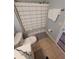 Bathroom with shower/tub combo, gray and white decor, and modern vanity at 153 Pompano Beach Dr, Kissimmee, FL 34746