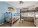 Toy Story-themed bedroom with bunk beds and ample closet space at 2619 Archfeld Blvd, Kissimmee, FL 34747