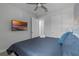 Comfortable bedroom with a queen bed, TV and private bathroom access at 368 Southfield St, Kissimmee, FL 34747