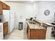 Kitchen with granite countertops and modern appliances at 2280 San Vital Dr # 105, Kissimmee, FL 34741