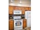 Well-equipped kitchen with modern appliances and granite countertops at 2280 San Vital Dr # 105, Kissimmee, FL 34741