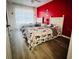 Mickey Mouse themed bedroom with two twin beds and red walls at 2280 San Vital Dr # 105, Kissimmee, FL 34741