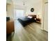 Spacious primary bedroom with king-size bed and ample natural light at 2280 San Vital Dr # 105, Kissimmee, FL 34741