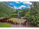 Modern art installation in a landscaped garden setting at 7127 Harmony Square S Dr # 7127, Harmony, FL 34773
